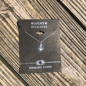 Never worn sterling silver anchor necklace